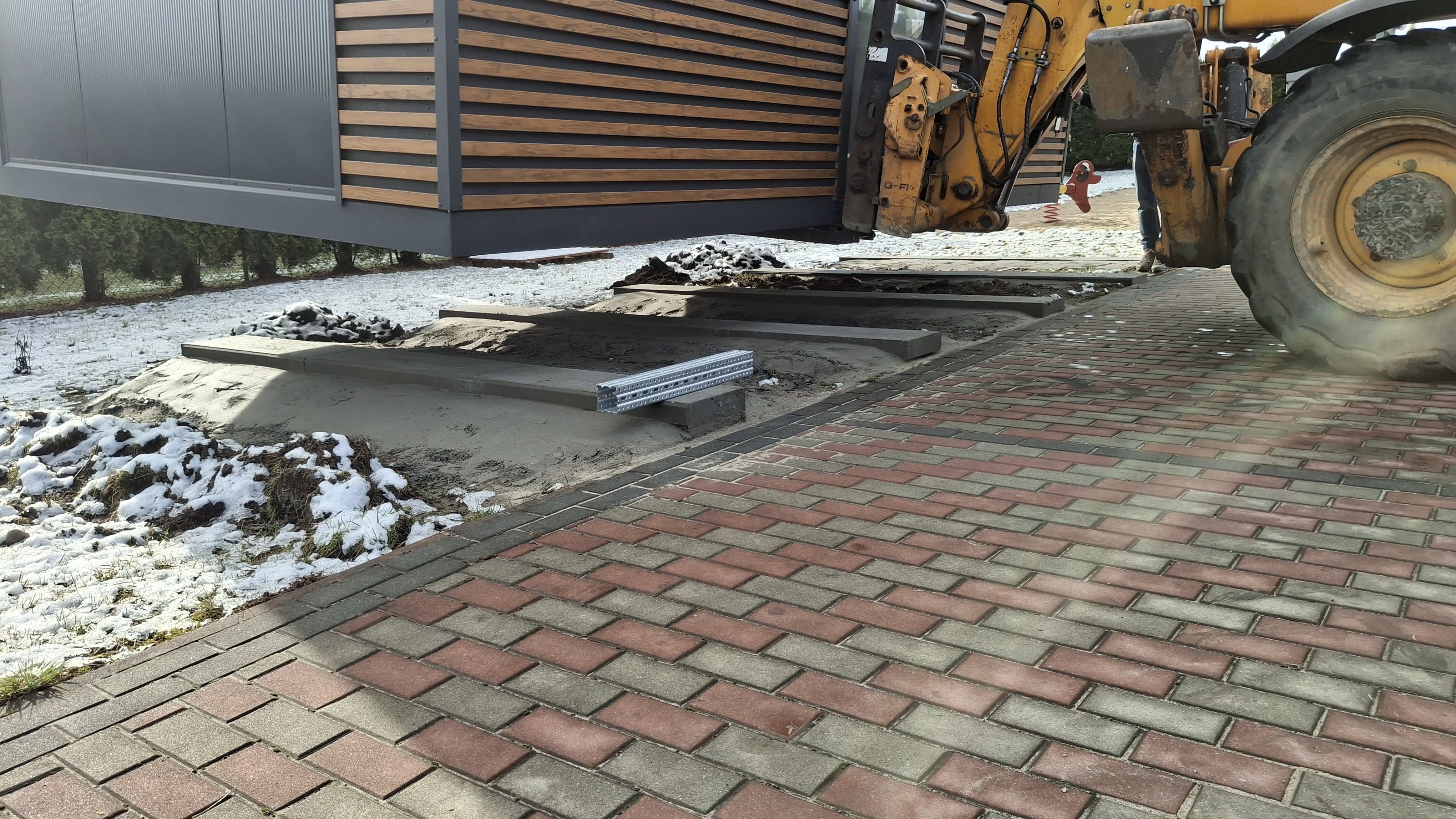 Container being placed with forklift