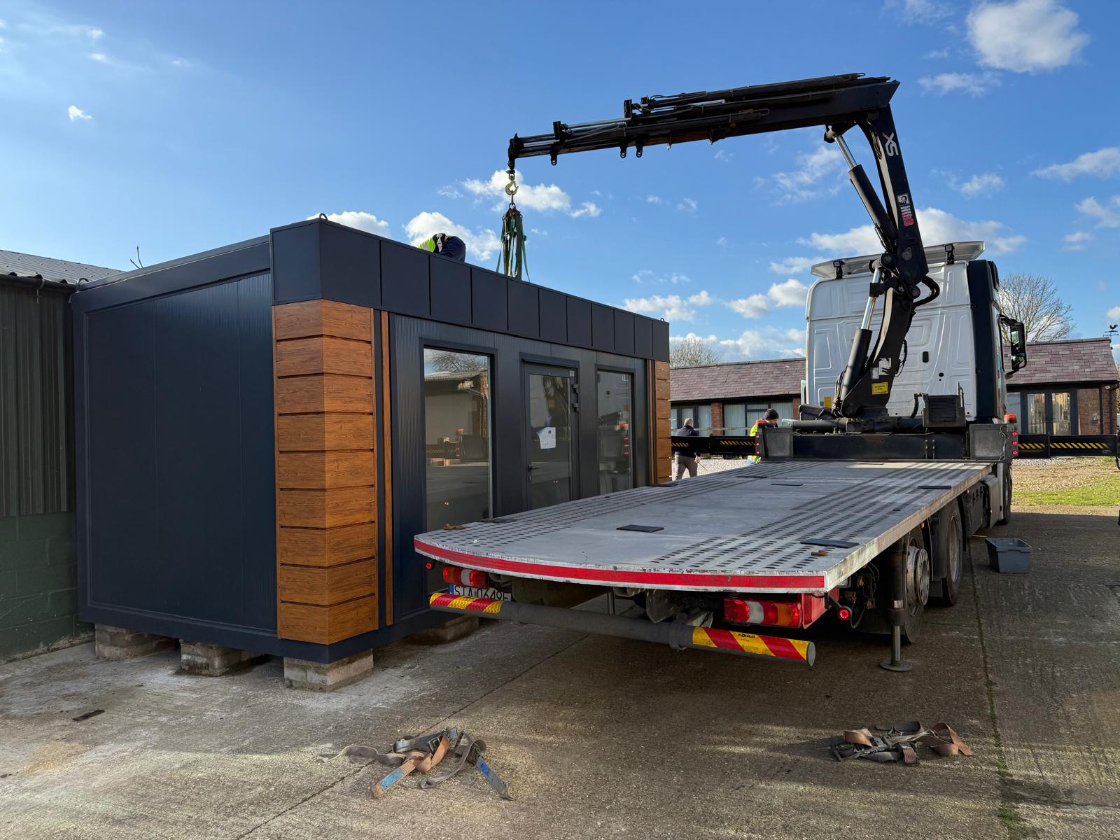Container being unloaded sideways
