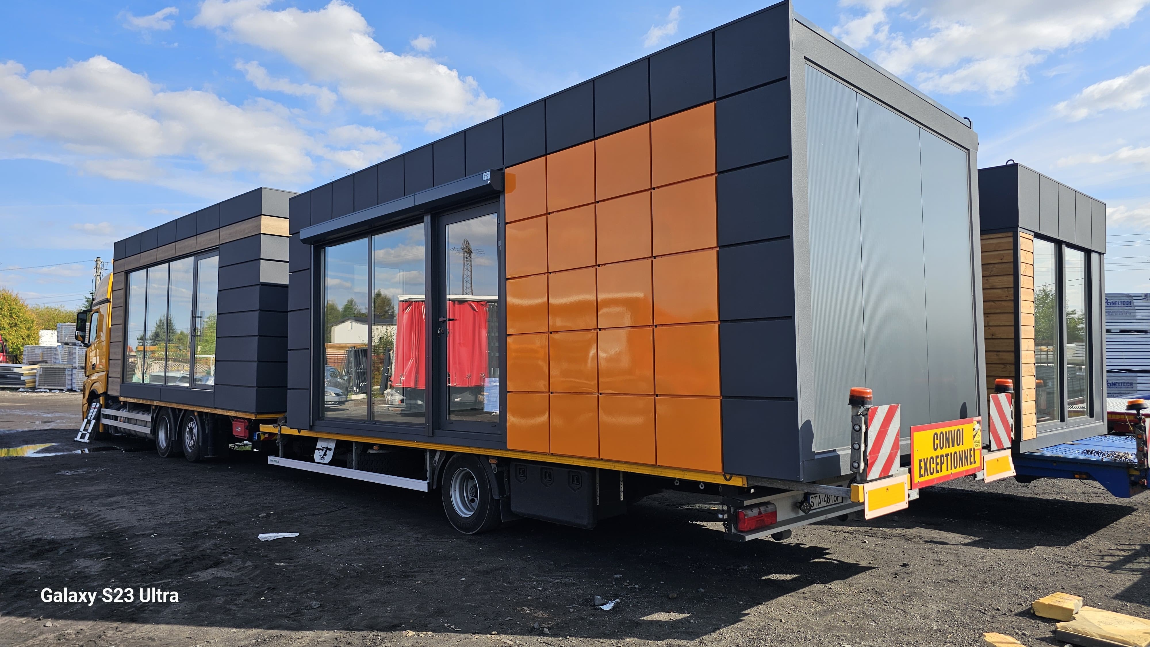 Dampol truck transporting 2 containers